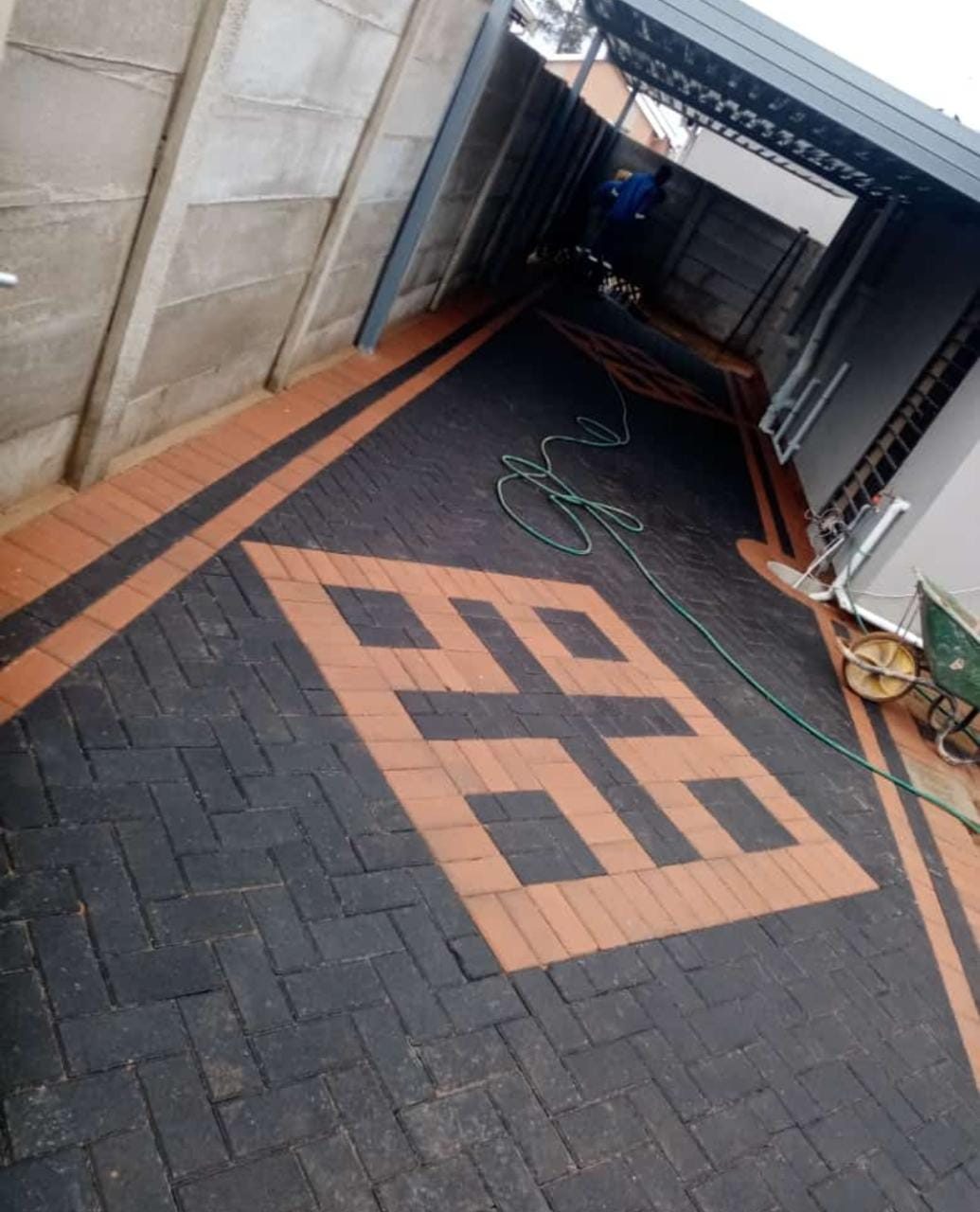 Signature black and orange geometric decorative concrete feature design